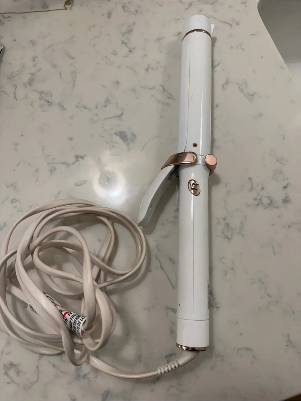 T3 Singlepass 1.25 inch ceramic curling iron in white and Rose Gold